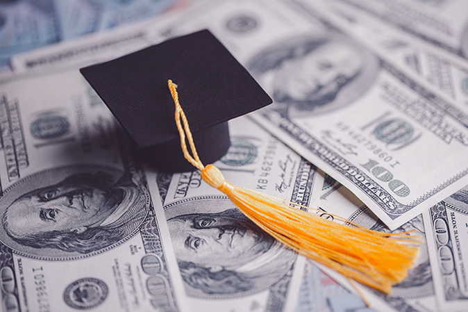 Saving money coin with banking investment, finance education concept. Planning student loan for studying abroad for college or university degree. Future children's education fund cash. Growing saving