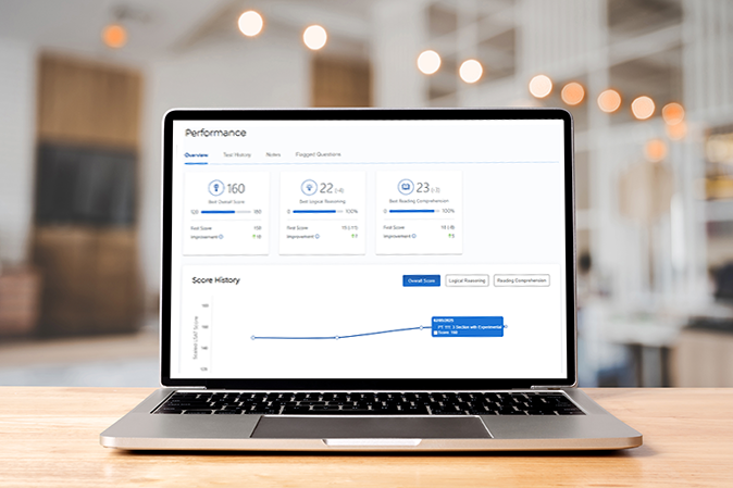 Laptop sitting on a table with the LSAT prep course on the screen