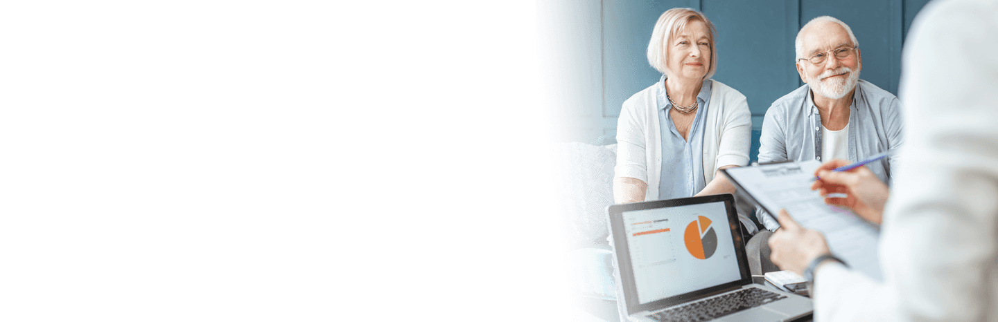 A business woman going over finances with an elderly couple