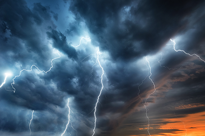 Lightning storm at sunset