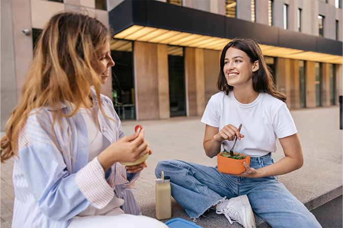 Young women having lunch outside